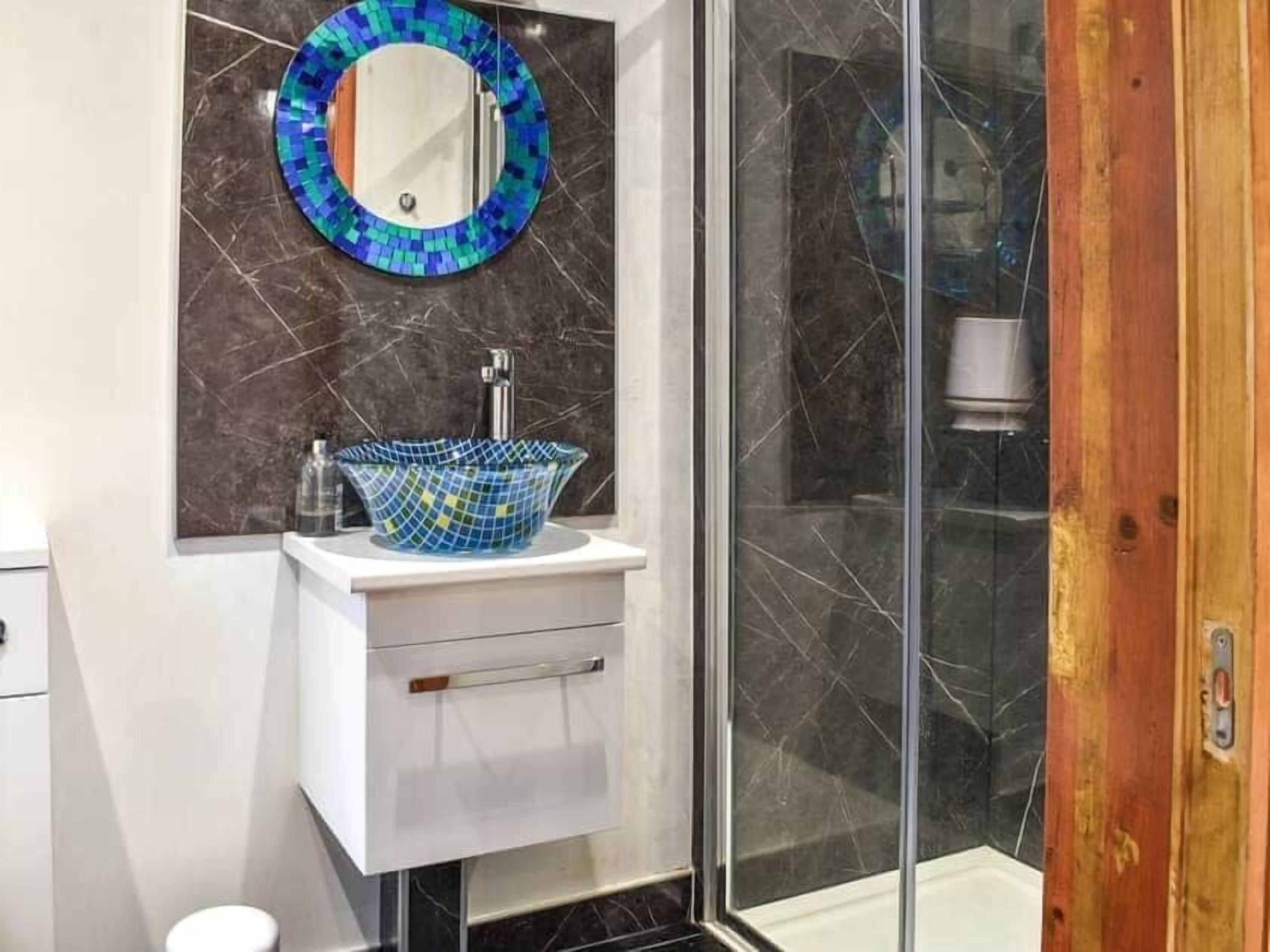 Rainfall showerhead, bathrobes, towels, soap