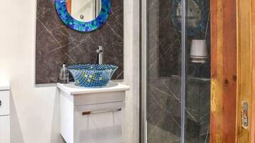 Rainfall showerhead, bathrobes, towels, soap