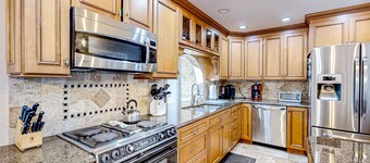 River view home within walking distance of the beach - bikes, grill, and yard