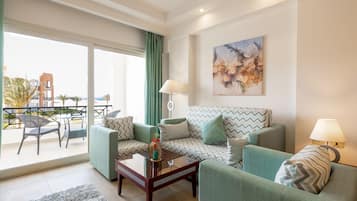 Two Bedrooms | Living area | 40-inch flat-screen TV with cable channels