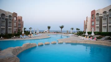 2 outdoor pools, pool umbrellas, sun loungers