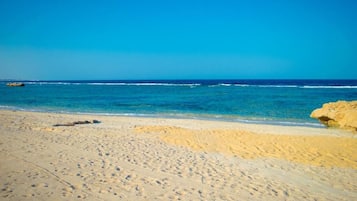 Private beach, sun loungers, beach umbrellas, beach towels