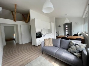 Living area - Minimalist Apartment near Parndorf-Neusiedl See (Gemeinde Bruck an der Leitha)