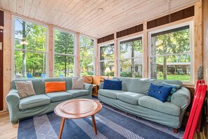 TV, fireplace - Amazing riverfront retreat with firepit, patio, W/D, & great views (Honor)