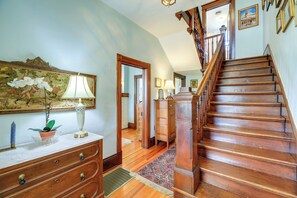 A staircase with wooden steps and a wooden railing. - 3 Mi to South Holston Lake: Home w/ Mtn Views (Bristol)