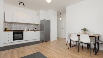 Apartment, 1 Bedroom, Balcony | Private kitchen | Dishwasher, cookware/dishes/utensils