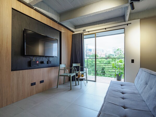 Living area - Nature Meets Comfort: Patio Bonito Studio with AC (Medellin)