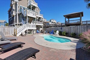 A heated pool - Experience beachfront luxury at 1128 Sweet Carolina Discounts for open 2026 dates (North Topsail Beach)