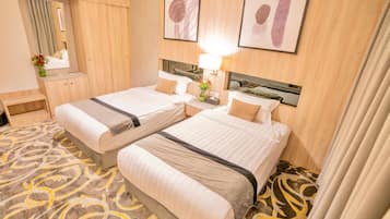 Desk, laptop workspace, free WiFi, bed sheets