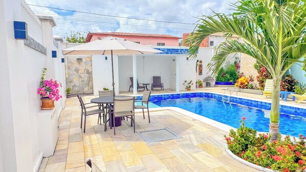 2 indoor pools, open 8:00 AM to 7:00 PM, pool umbrellas