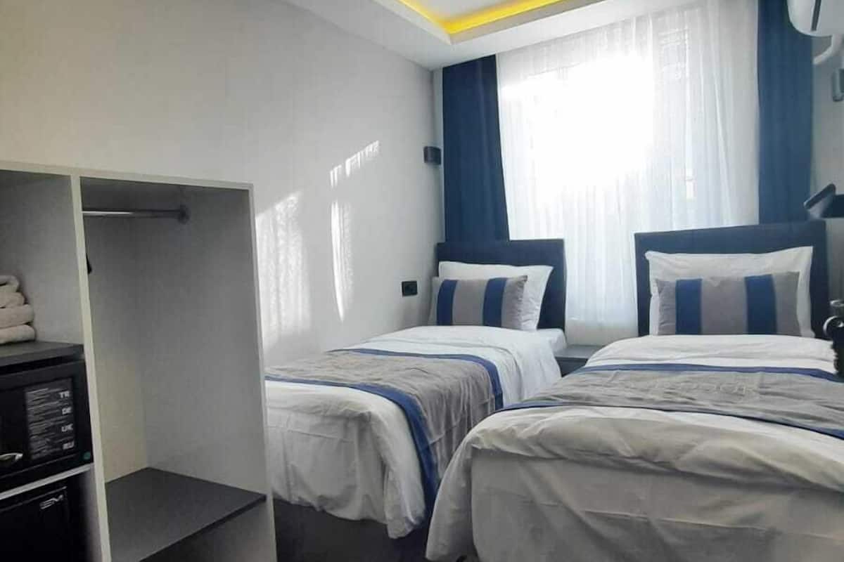Premium bedding, minibar, blackout curtains, soundproofing