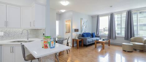 Comfort Apartment, 2 Bedrooms | Living area | 42-inch flat-screen TV with digital channels