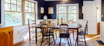 Countryside mountain-view retreat with screened-in porch, near skiing & golf