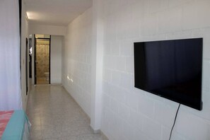 Family Apartment, Multiple Beds, Kitchen | Television