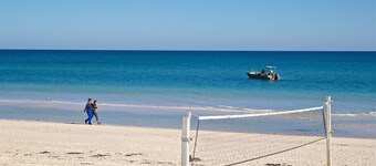Enjoy beachside vibes at beautiful Henley Beach!