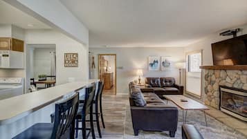 Premium Condo | Living area | Fireplace