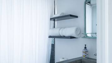 Hair dryer, towels, soap, shampoo