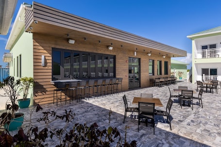 Breakfast, lunch, dinner served; Caribbean cuisine, pool views