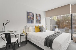 2 bedrooms, desk, iron/ironing board, travel cot