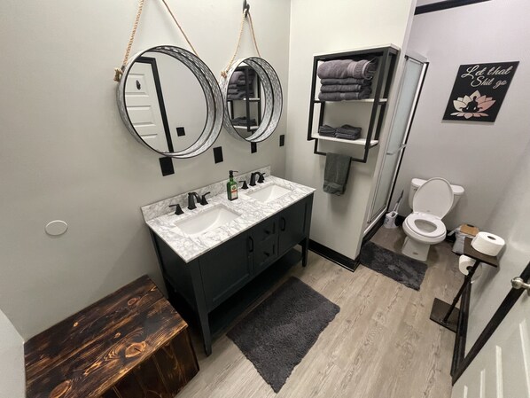 Shower, hair dryer, towels, soap