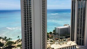 Two high-rise buildings with a view of the ocean and beach. - Contemporary Waikiki Beach Condo with Rooftop Pool, Superb Shopping and Dinning  (Honolulu)