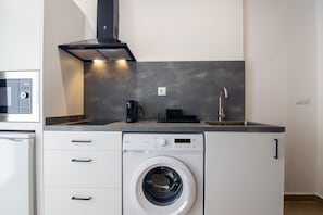 Fridge, microwave, stovetop, coffee/tea maker