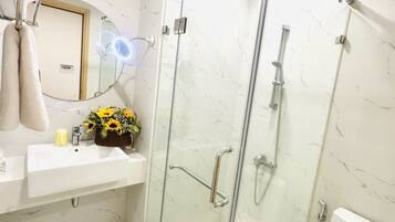 Hair dryer, bidet, towels, soap