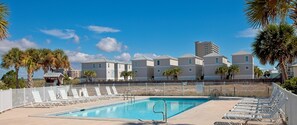 A heated pool - Serendipity Sands by Kaiser Vacations | Pass Time Cottages with Gulf Views, Beach, Lagoon Access (Gulf Shores)