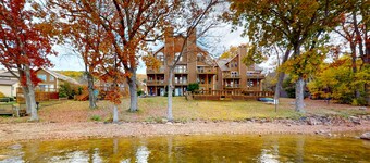 Lake-view townhome with private patio, rec room, & seasonal boat slip