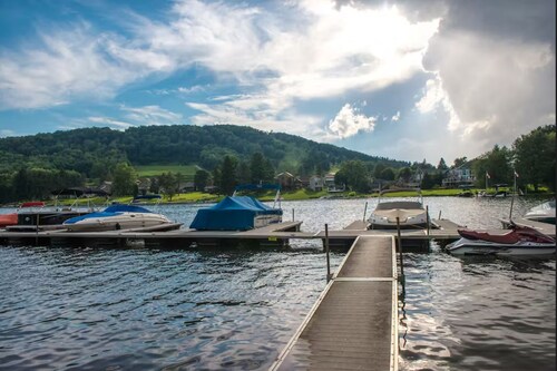 Lake-view townhome with private patio, rec room, & seasonal boat slip