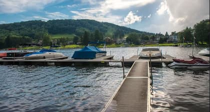 Lake-view townhome with private patio, rec room, & seasonal boat slip