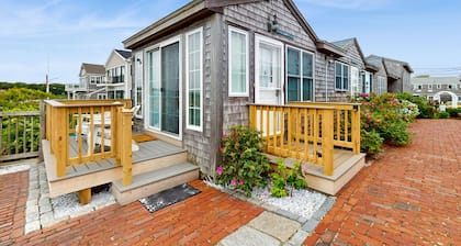 Quintessential coastal studio with beach access, BBQ area, patio, & water views