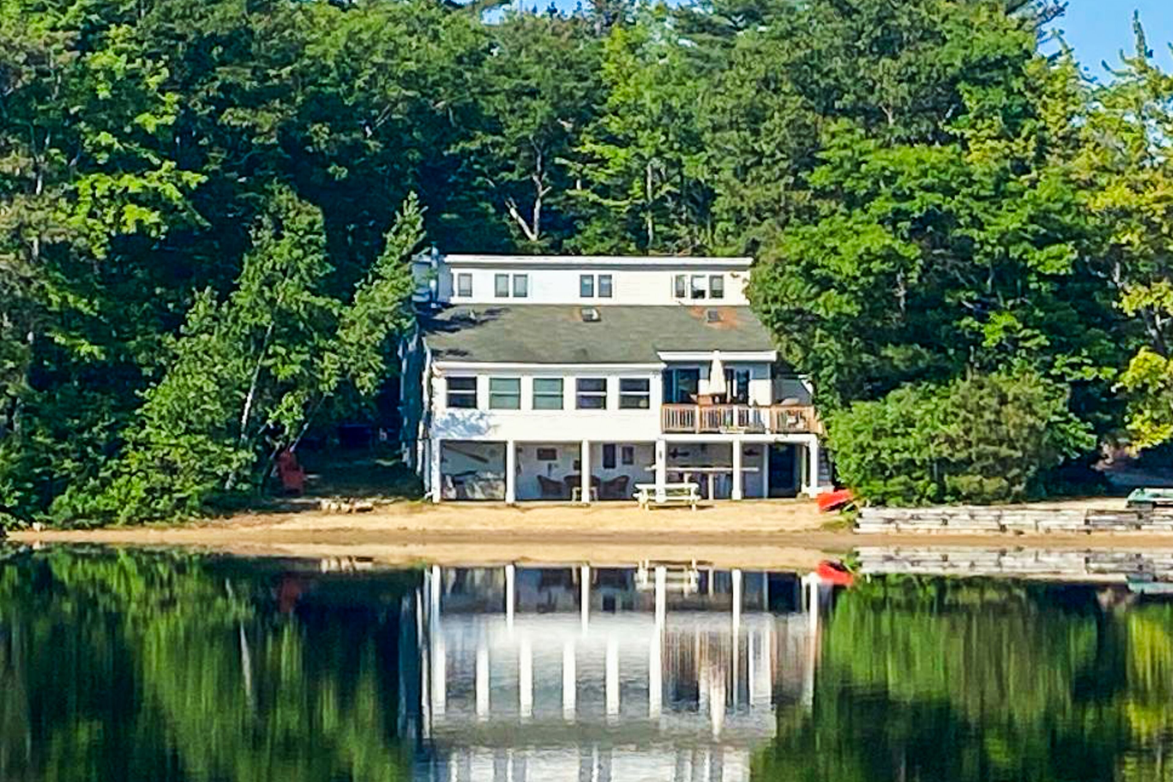 Lakefront home with private beach, dock, kayaks/canoe, & hot tub