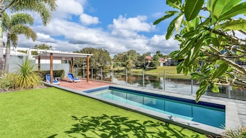 Pool and gardens leading down to the creek