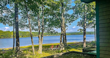 Cozy lakefront cabin with amazing views, deck, firepit, & water access
