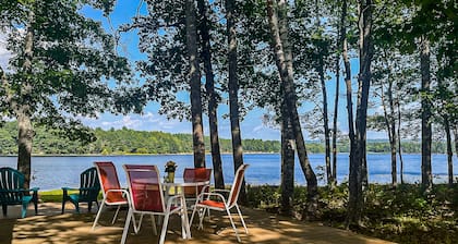 Cozy lakefront cabin with amazing views, deck, firepit, & water access
