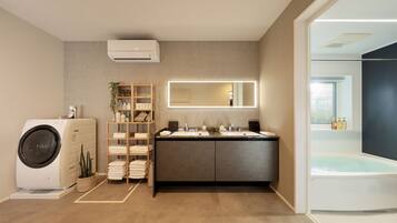 Combined shower/tub, free toiletries, hair dryer, bathrobes