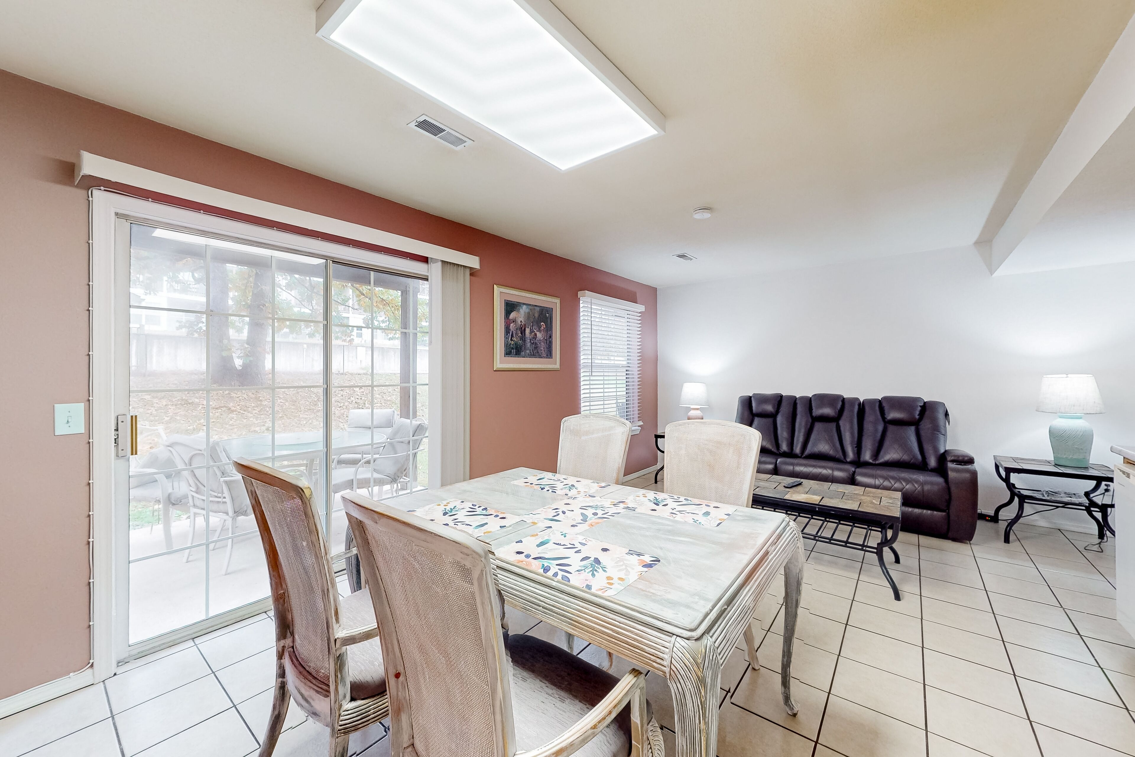 Comfortable, single-level condo with a furnished patio, washer/dryer, & AC