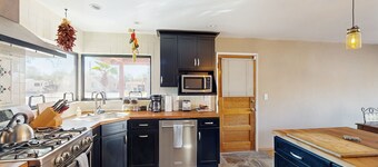 Sun-soaked & charming dog-friendly retreat with private pool, large patio, & W/D