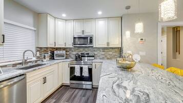 Fridge, microwave, dishwasher, coffee/tea maker