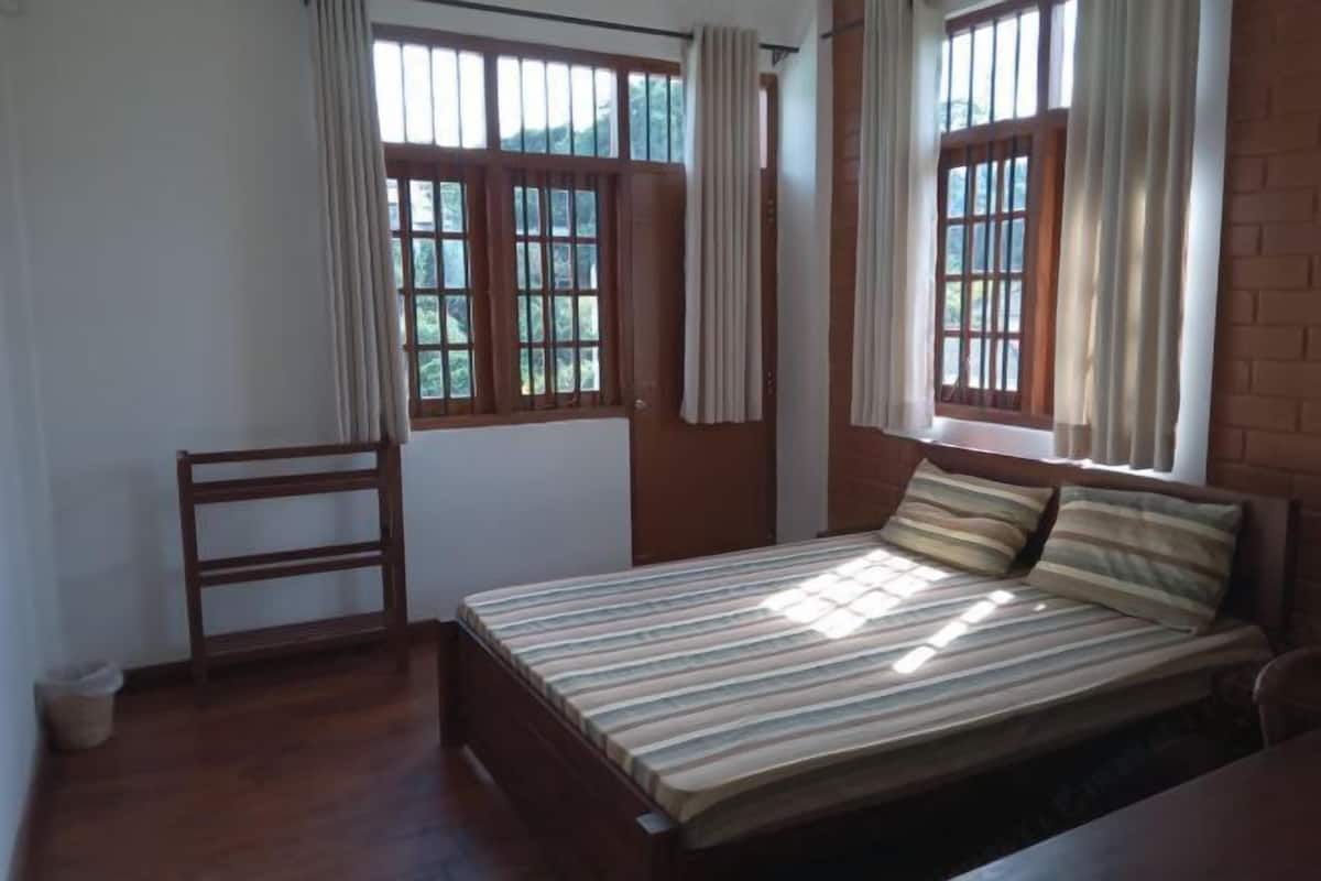 Individually furnished, desk, laptop workspace, iron/ironing board