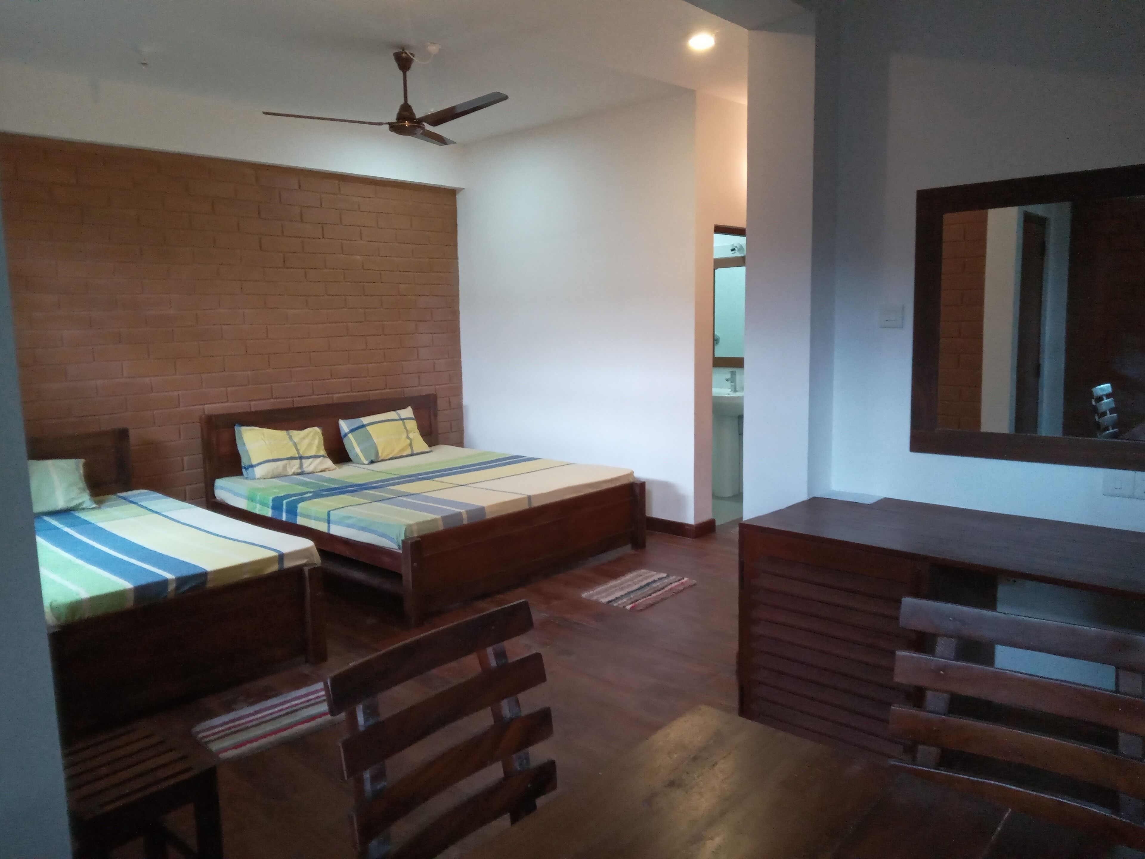 Basic Triple Room, Multiple Beds, Non Smoking, Hill View | Individually furnished, desk, laptop workspace, iron/ironing board