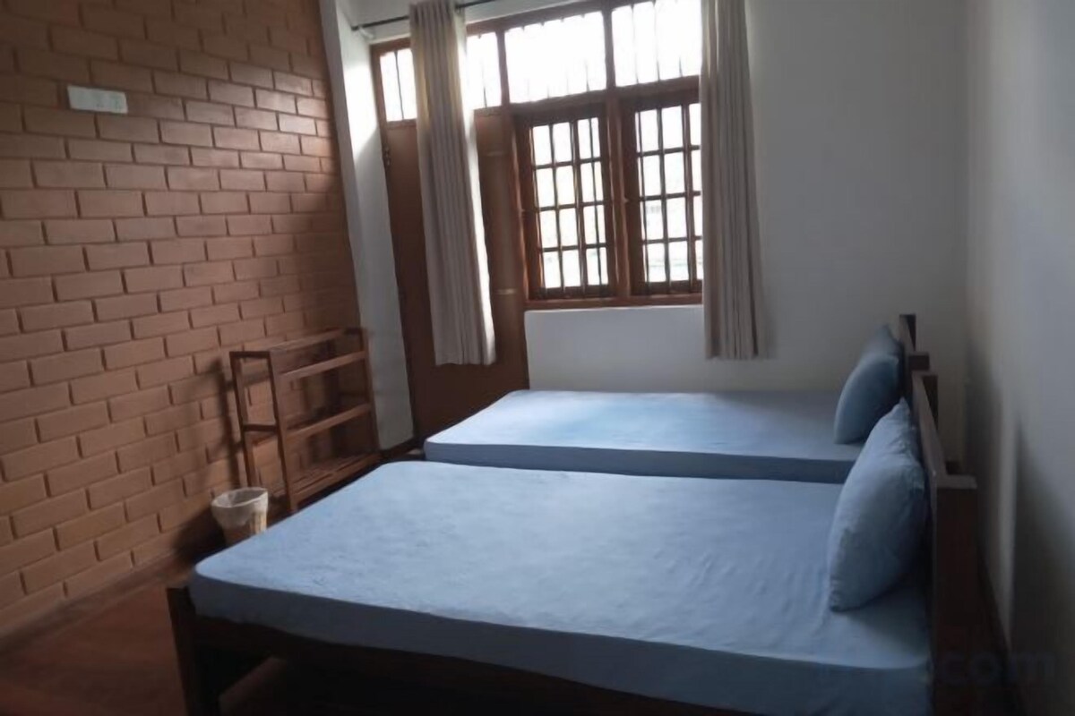 AC Room With Two Single Beds