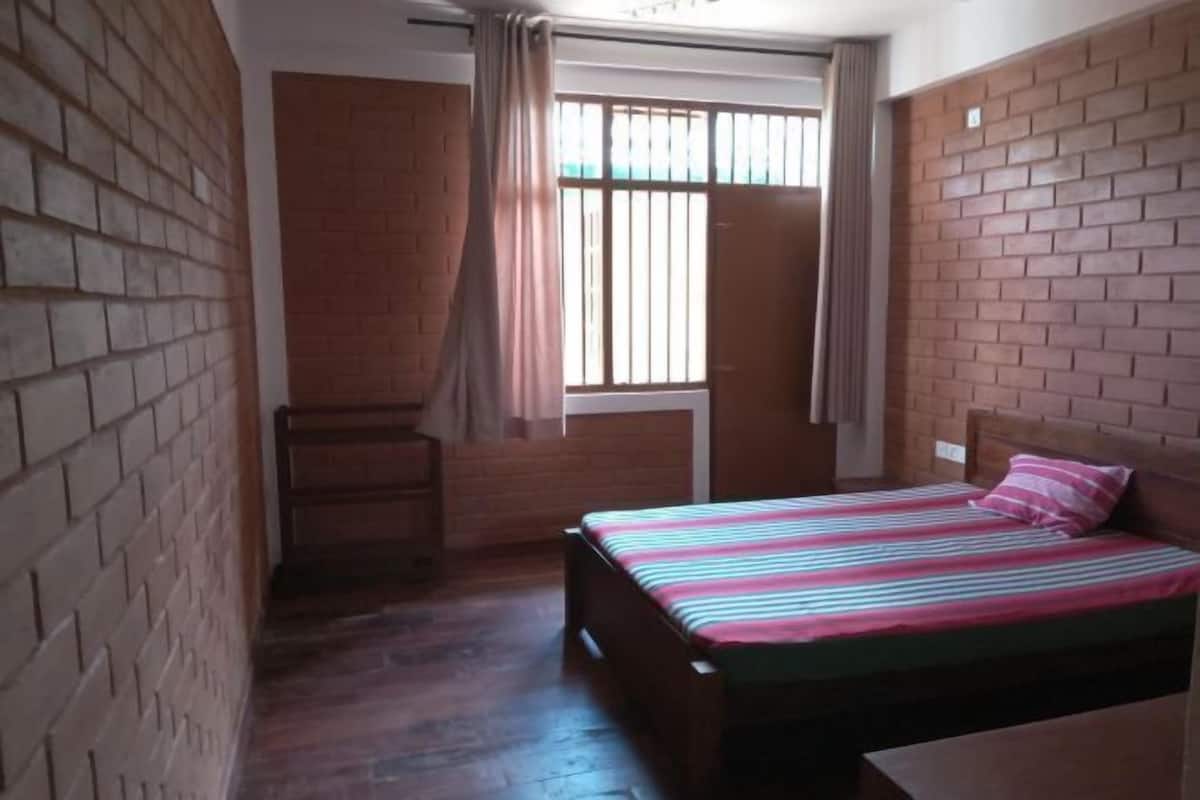 Individually furnished, desk, laptop workspace, iron/ironing board