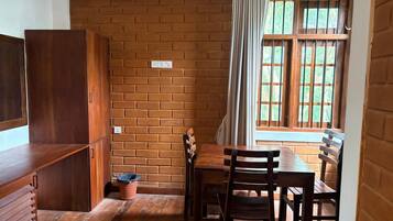 Basic Triple Room, Multiple Beds, Non Smoking, Hill View | Living area