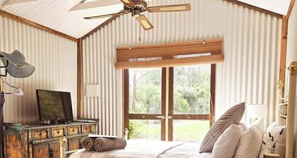 A converted country barn is set in it's own English country courtyard garden.