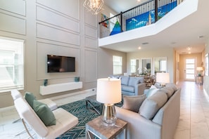 Casa, varias camas (780SST- The Retreat at ChampionsGate) | Área de sala de estar