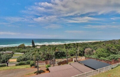 Wake up to the tranquil sight and sound of waves crashing against the shore.