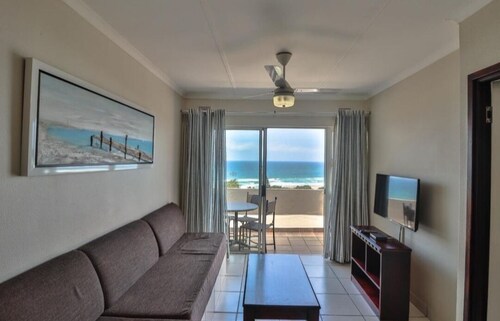 Wake up to the tranquil sight and sound of waves crashing against the shore.