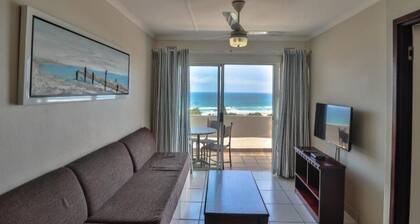 Wake up to the tranquil sight and sound of waves crashing against the shore.